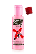 Pink bottle of Crazy Color hair color cream with a sample of red hair color on a white background